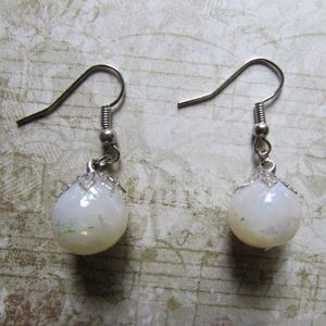 Opal white colored silver tone earrings iridescent
